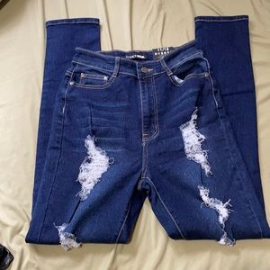 Distressed dark wash jeans